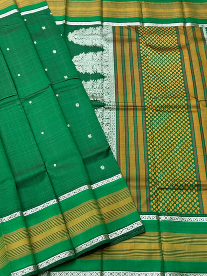 An elegant masterpiece forest green silver zari woven contemporary vanasingaram kanchivaram silk saree