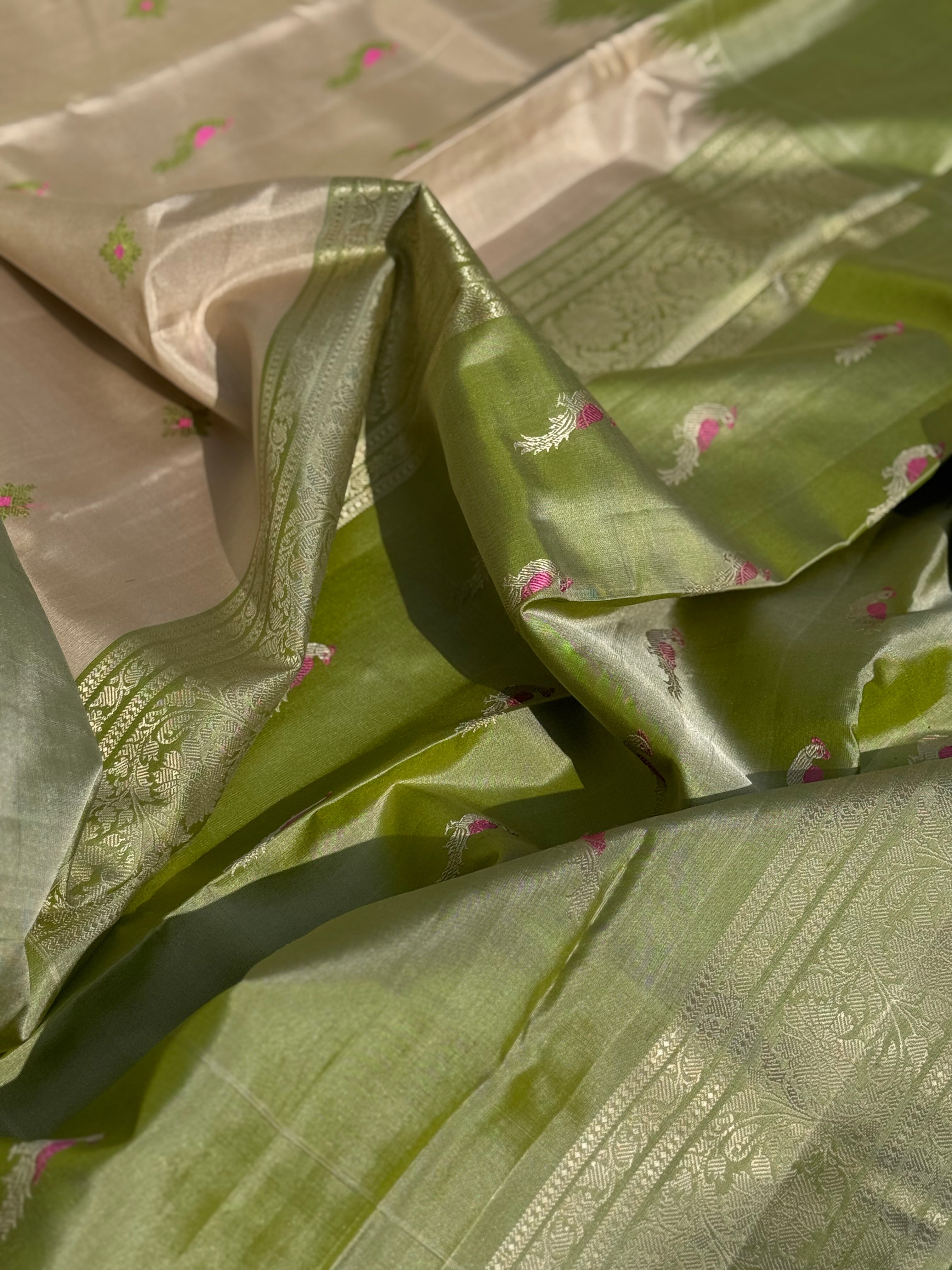 A gorgeous No Zari ivory with ivory and fern green handwoven soft and lustrous gadwal silk saree