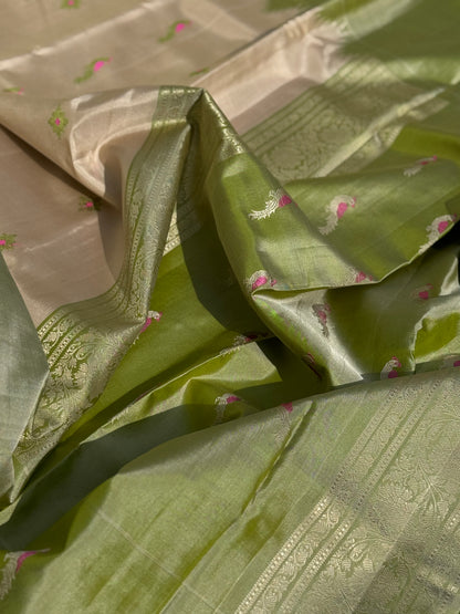 A gorgeous No Zari ivory with ivory and fern green handwoven soft and lustrous gadwal silk saree