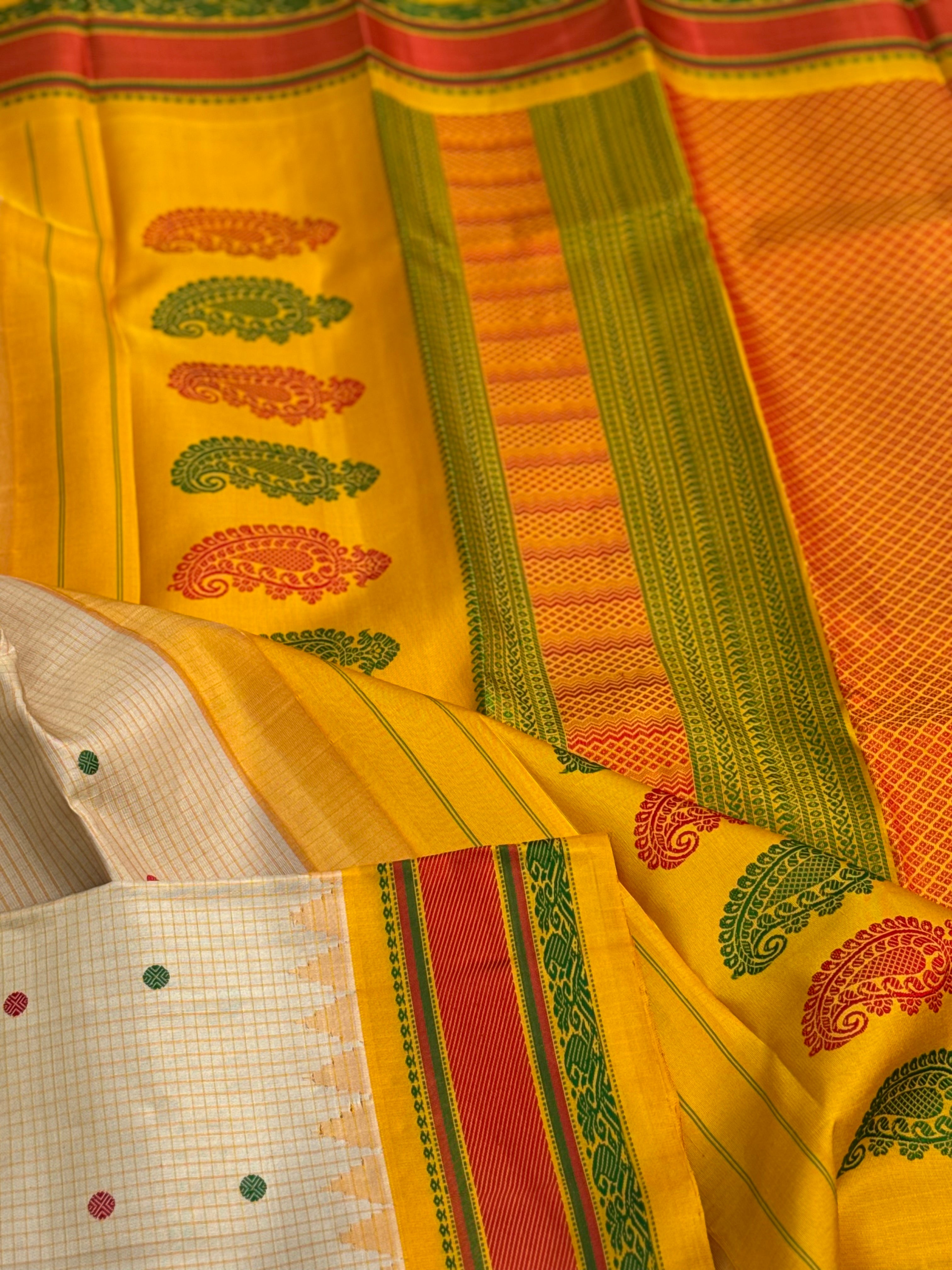 Yellow with green Gadwal silk saree with complete threadwork