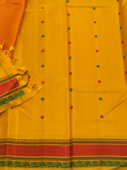 Yellow with green Gadwal silk saree with complete threadwork