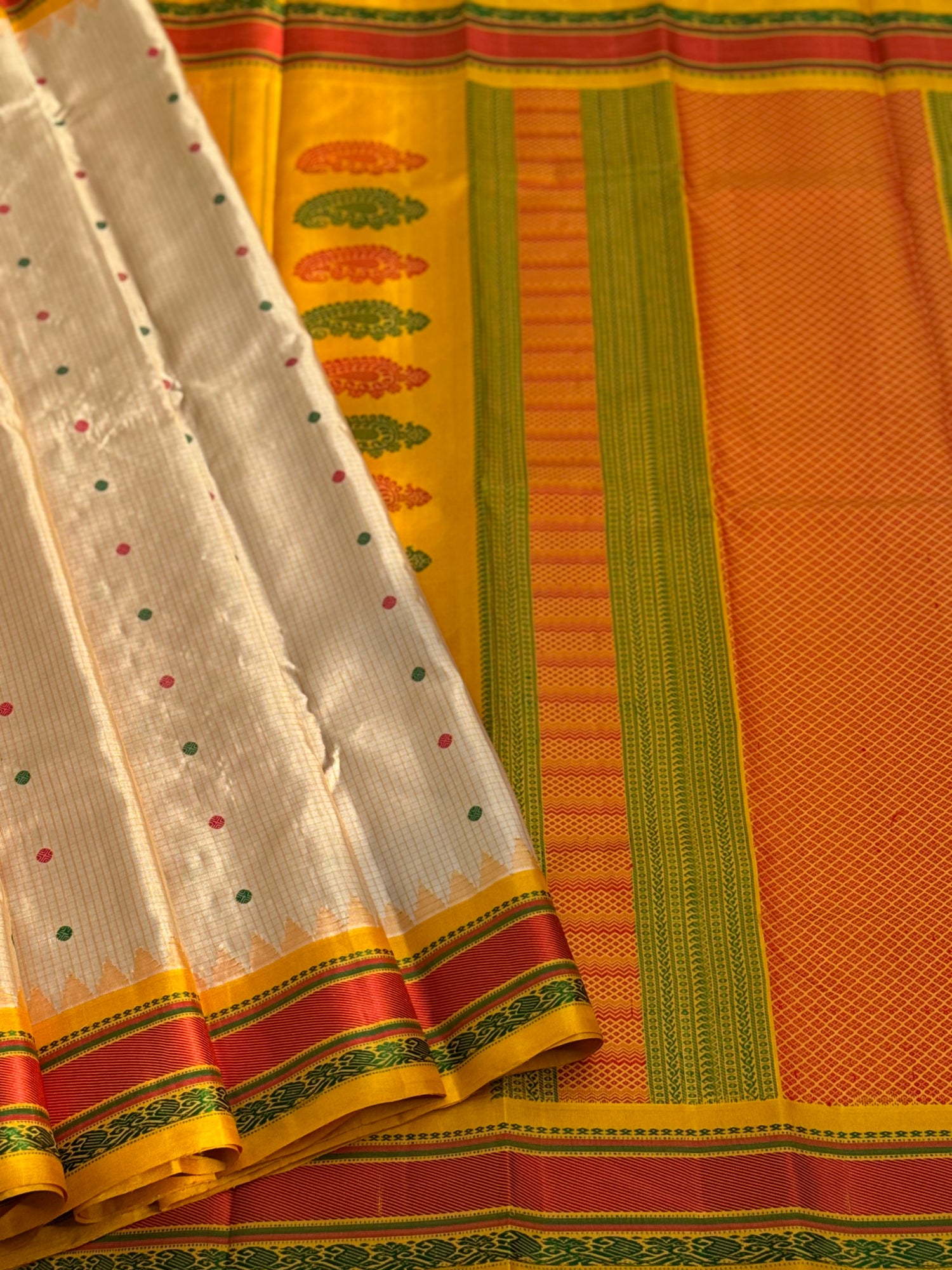 Yellow with green Gadwal silk saree with complete threadwork