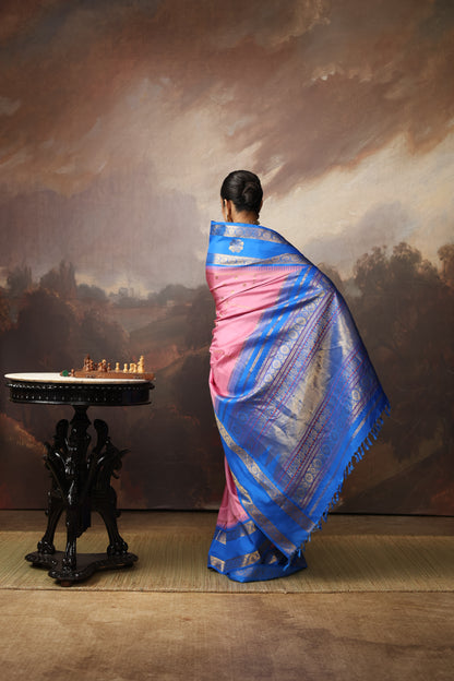 A unique vintage recreated and  beautiful combo of onion pink with cobalt blue korvai kanchivaram silk saree