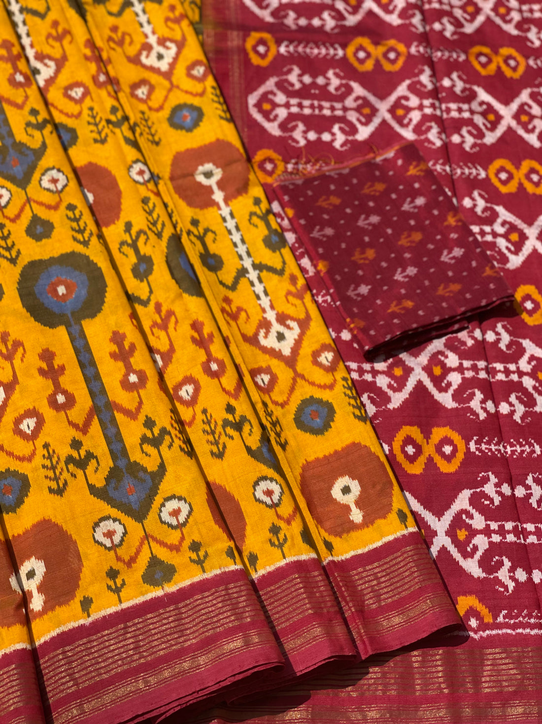 A stunner mustard yellow by deep burgundy premium tussar by mulberry silk ikkat SAREE
