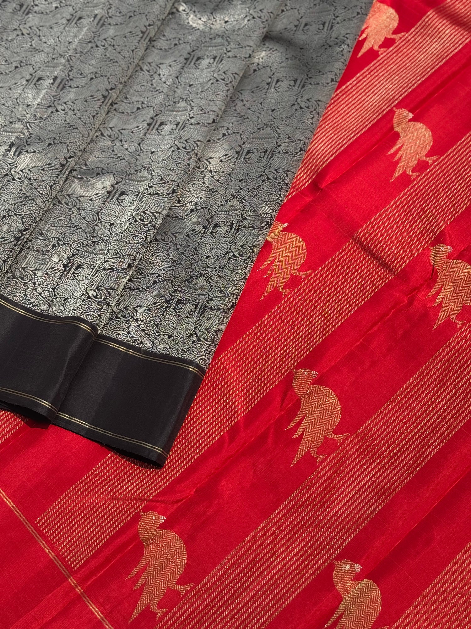 A stunner Masterpiece Garudaseva Adai kanchivaram woven silk saree in black and red