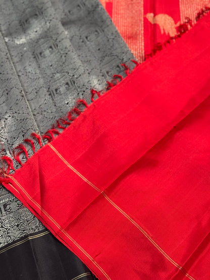 A stunner Masterpiece Garudaseva Adai kanchivaram woven silk saree in black and red