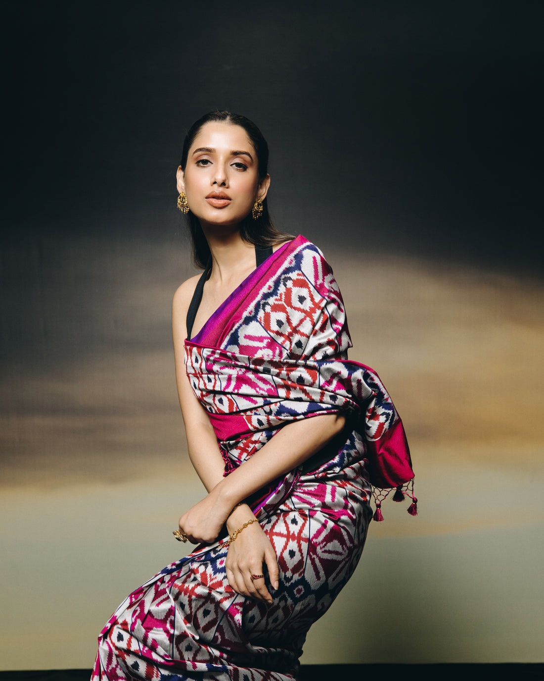 A stunning metallic colour with shot pink purple Uzbek silk ikkat saree inspired by the treasured archive pieces of the Victoria and Albert museum