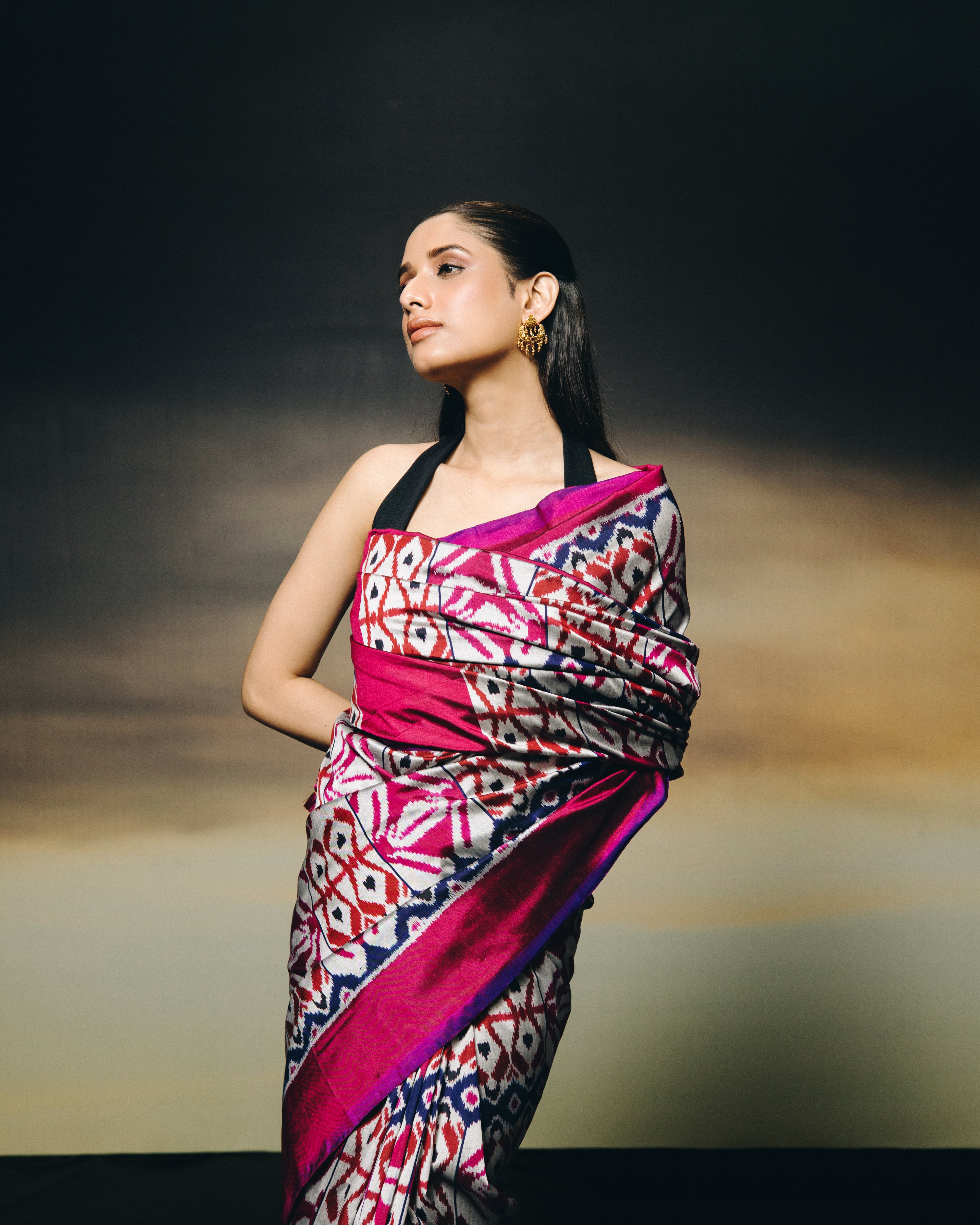 A stunning metallic colour with shot pink purple Uzbek silk ikkat saree inspired by the treasured archive pieces of the Victoria and Albert museum