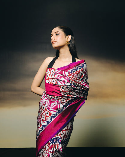A stunning metallic colour with shot pink purple Uzbek silk ikkat saree inspired by the treasured archive pieces of the Victoria and Albert museum