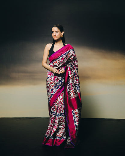 A stunning metallic colour with shot pink purple Uzbek silk ikkat saree inspired by the treasured archive pieces of the Victoria and Albert museum