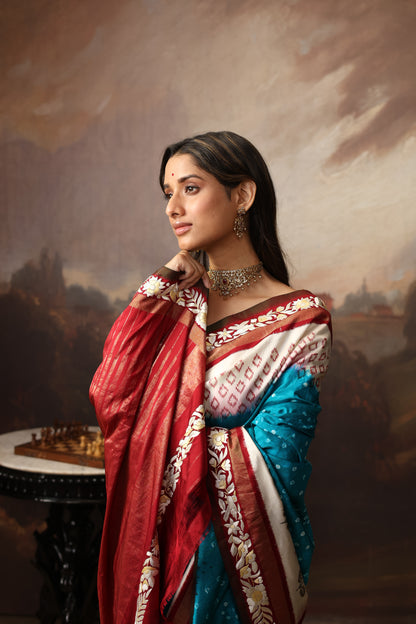 Gorgeous lotus ikkat silk saree with teal peacock blue Bhandej and  Parsi gara hand embroidery