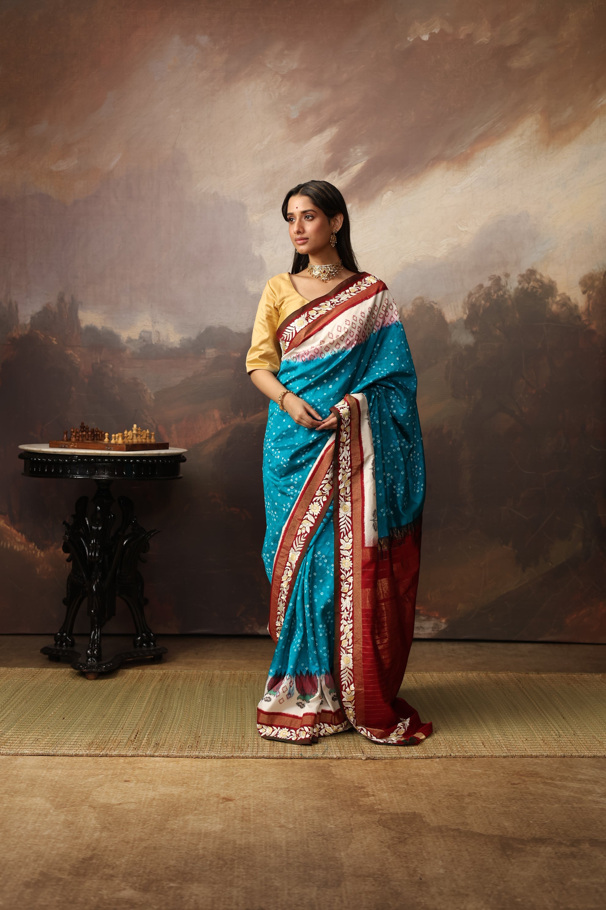 Gorgeous lotus ikkat silk saree with teal peacock blue Bhandej and  Parsi gara hand embroidery