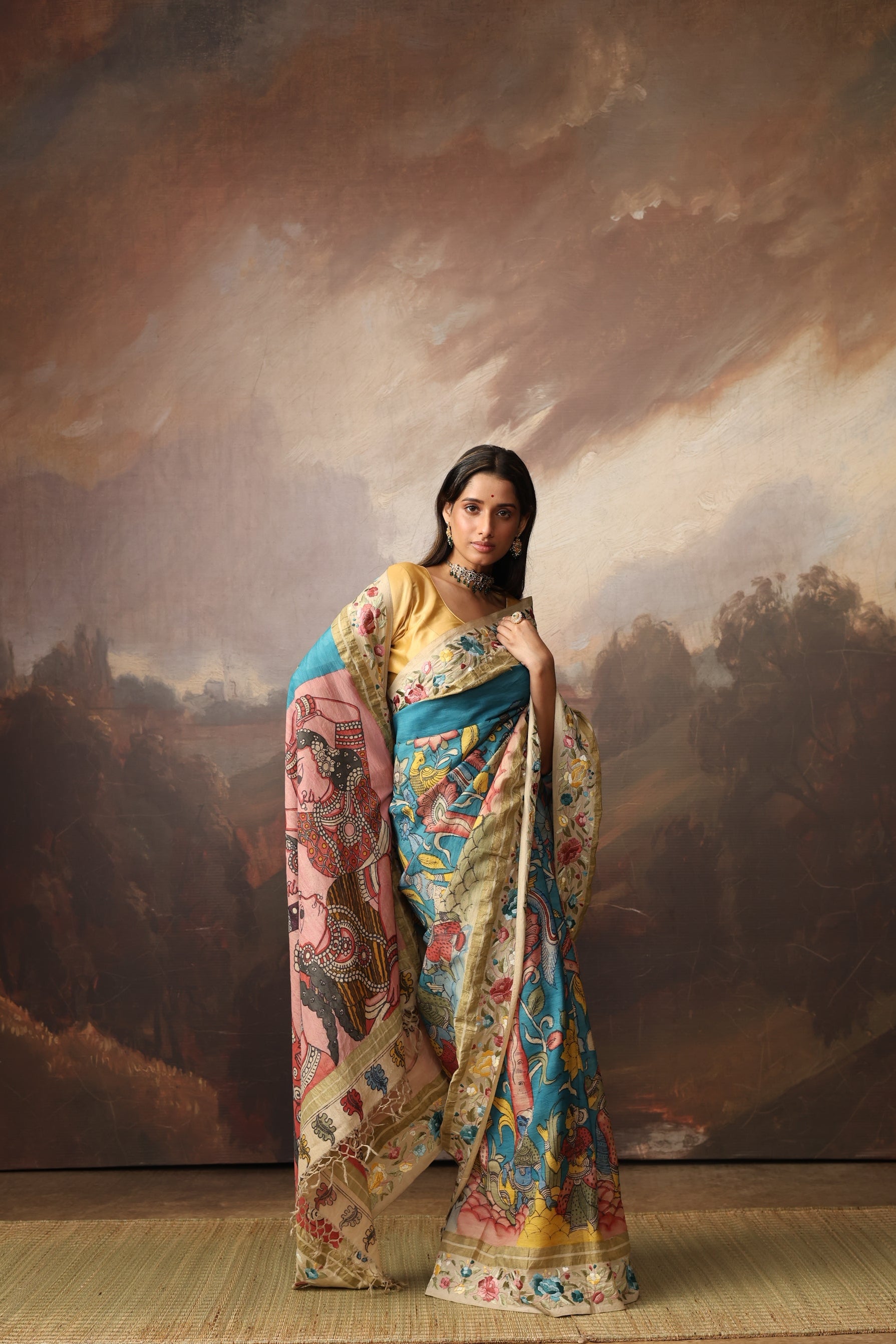 A masterpiece fusion of authentic Parsigara Handdrawn handpainted nayaka inspired penkalamkari on mulberry silk