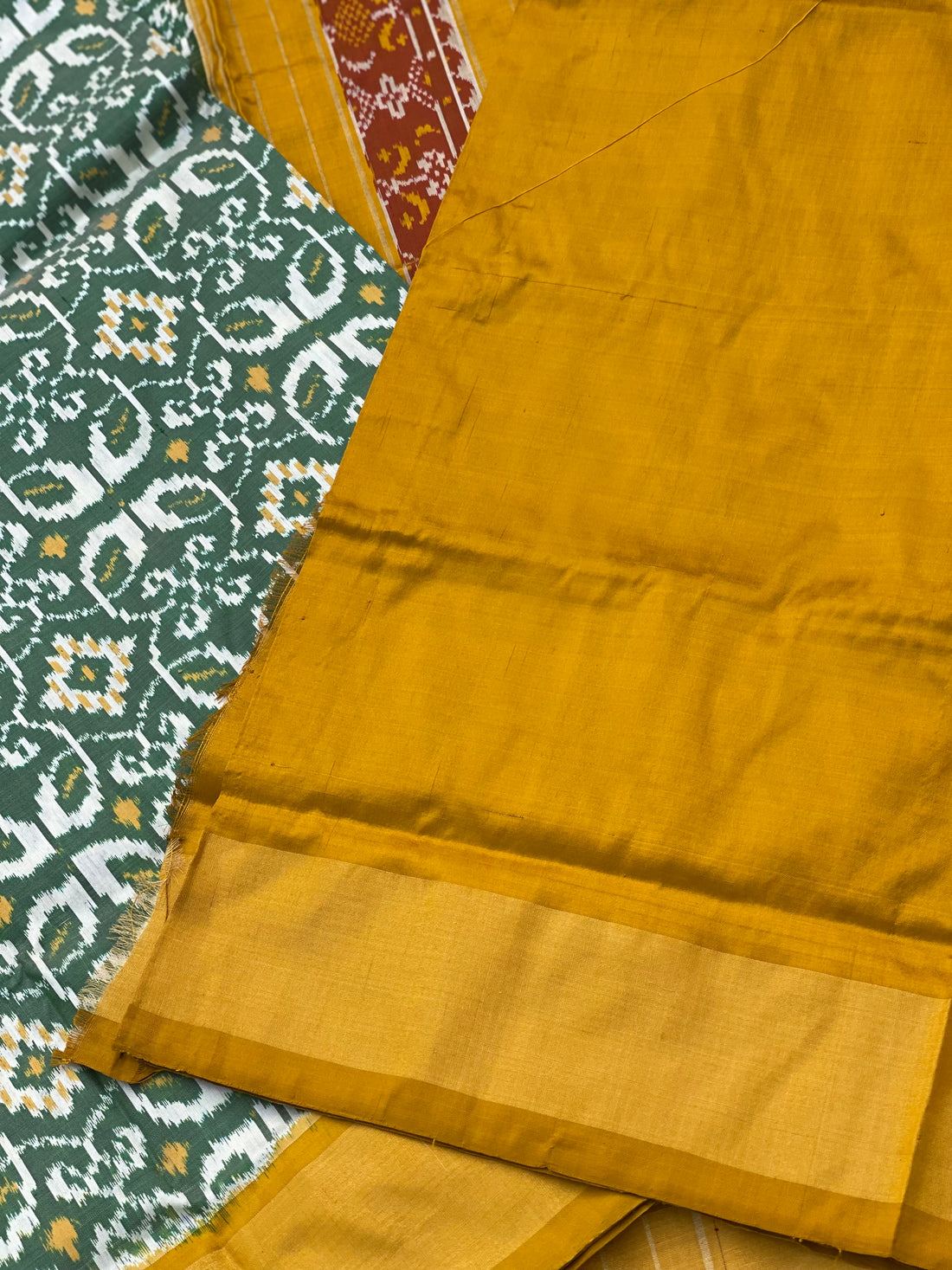 Single Ikkat silk saree with green and mustard yellow