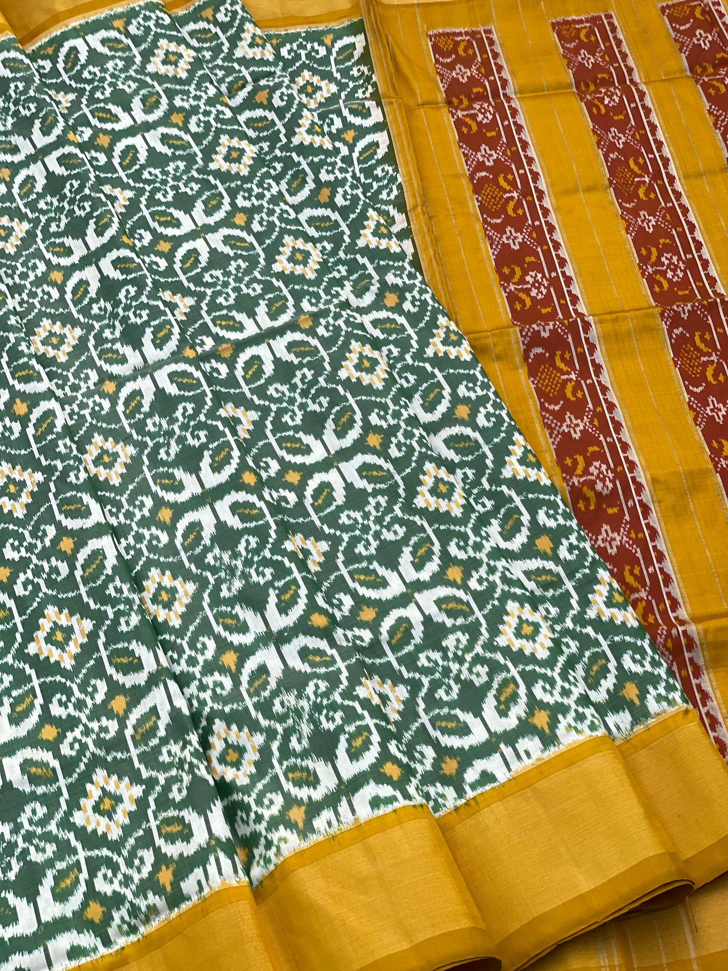 Single Ikkat silk saree with green and mustard yellow