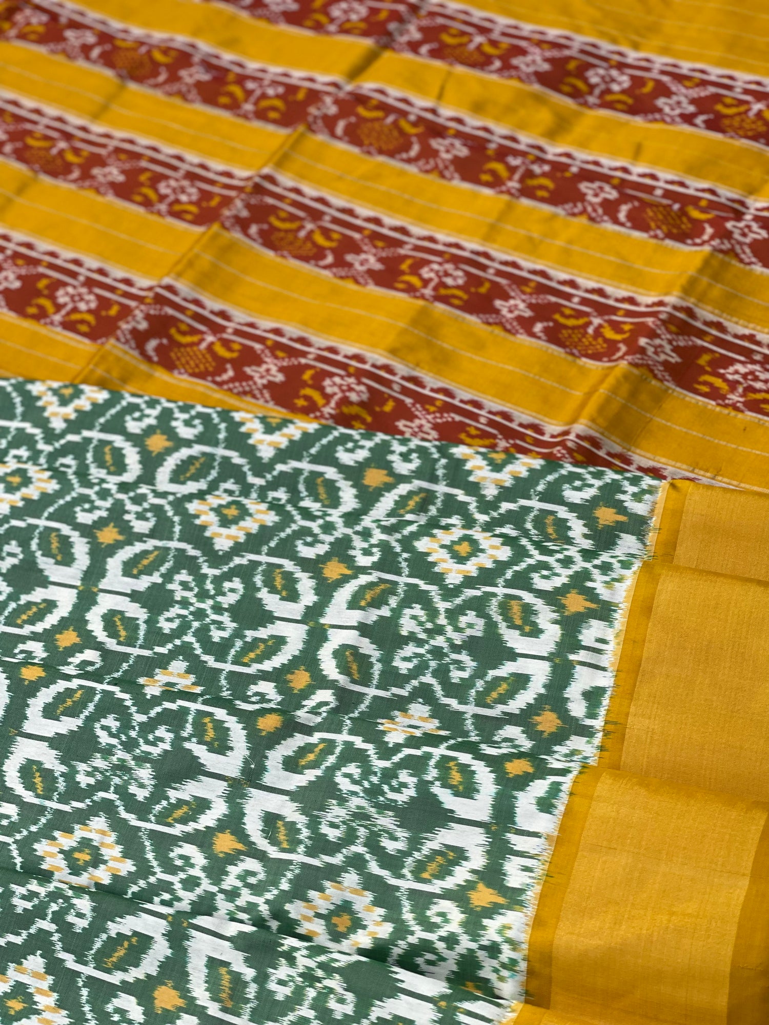 Single Ikkat silk saree with green and mustard yellow