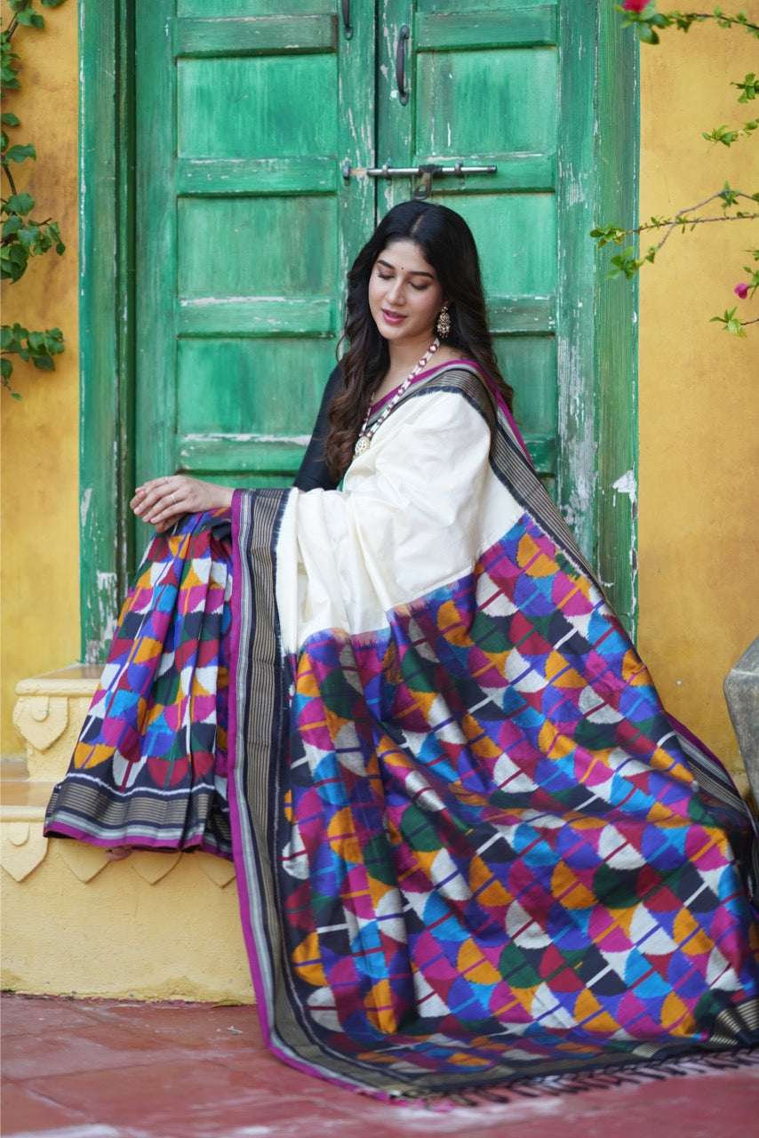 A Designer Exclusive multicolour blocks sil ikkat saree