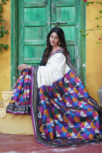 A Designer Exclusive multicolour blocks sil ikkat saree