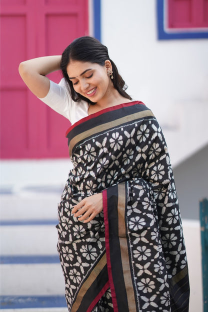 A contemporary premium mulberry silk ikkat saree