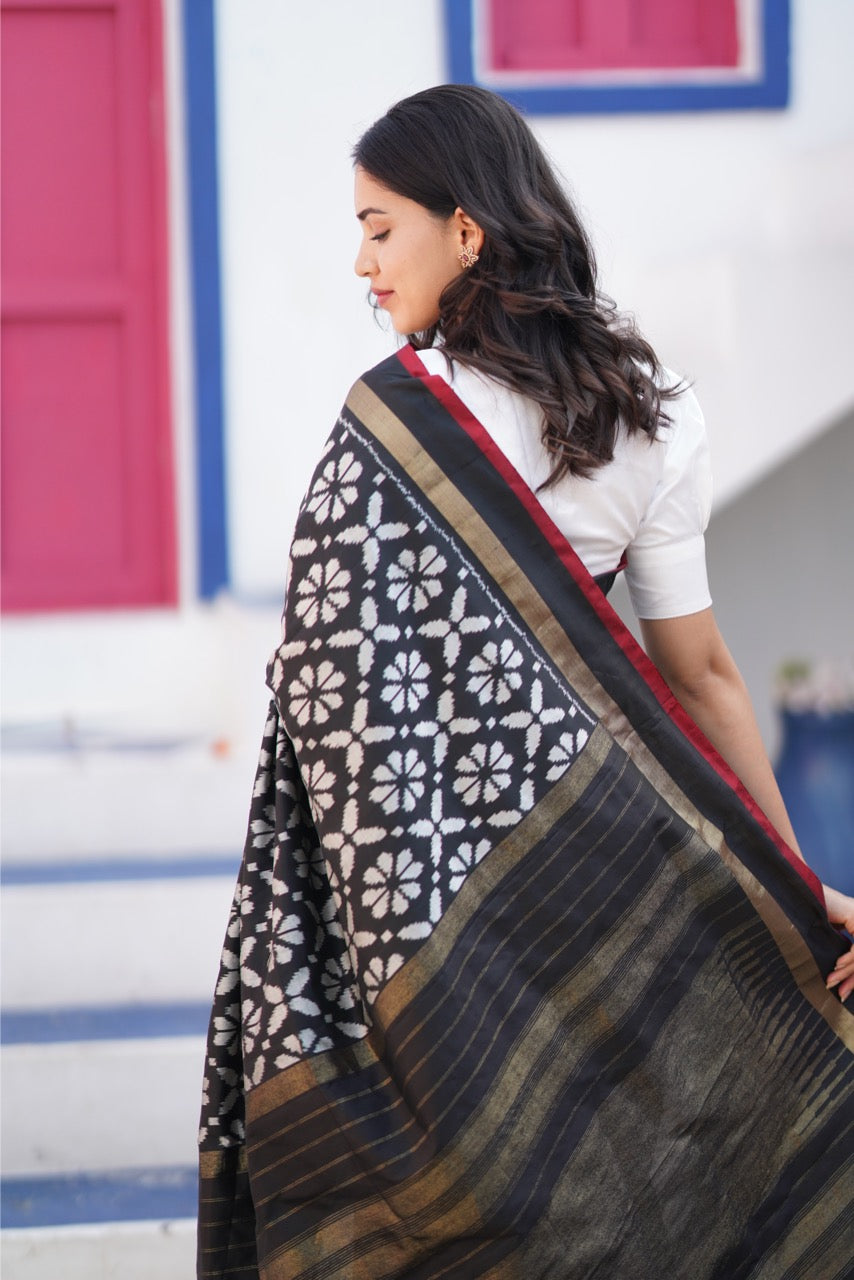 A contemporary premium mulberry silk ikkat saree