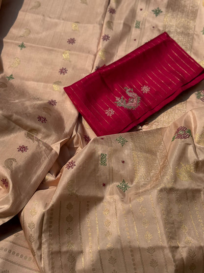 A designer exclusive almond shaded borderless kanchivaram silk saree With hand embroidered kasuti work