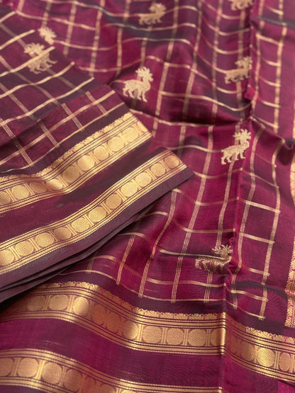 A gorgeous burgundy shade handwoven zari checks with deer motifs Kanchi  silk cotton saree