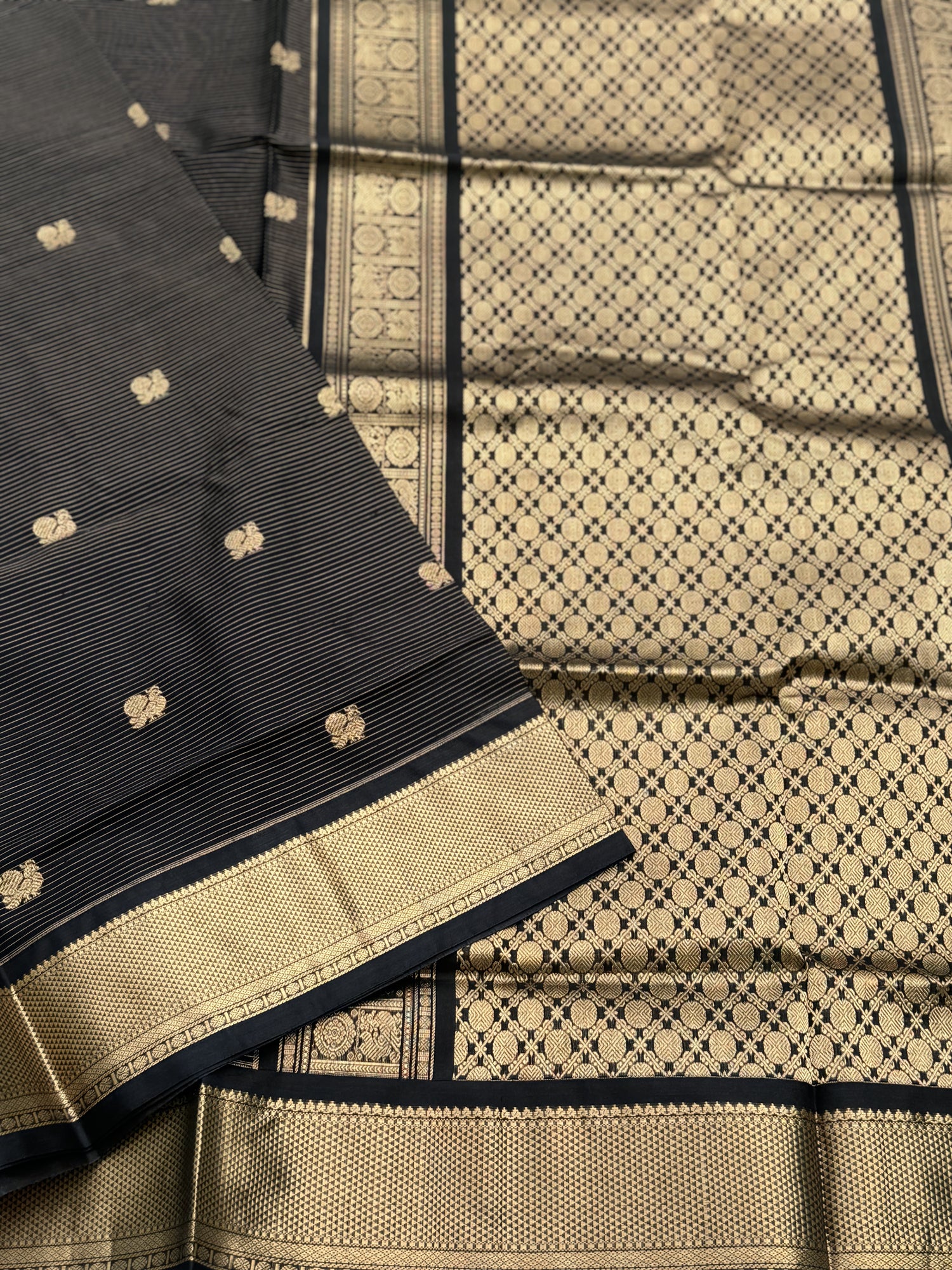 A gorgeous black Vairaoosi weave handwoven silk cotton saree