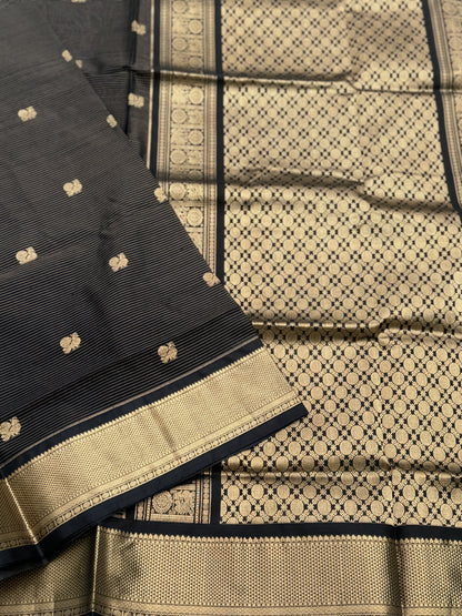 A gorgeous black Vairaoosi weave handwoven silk cotton saree