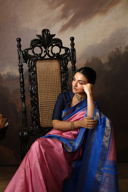 A unique vintage recreated and  beautiful combo of onion pink with cobalt blue korvai kanchivaram silk saree