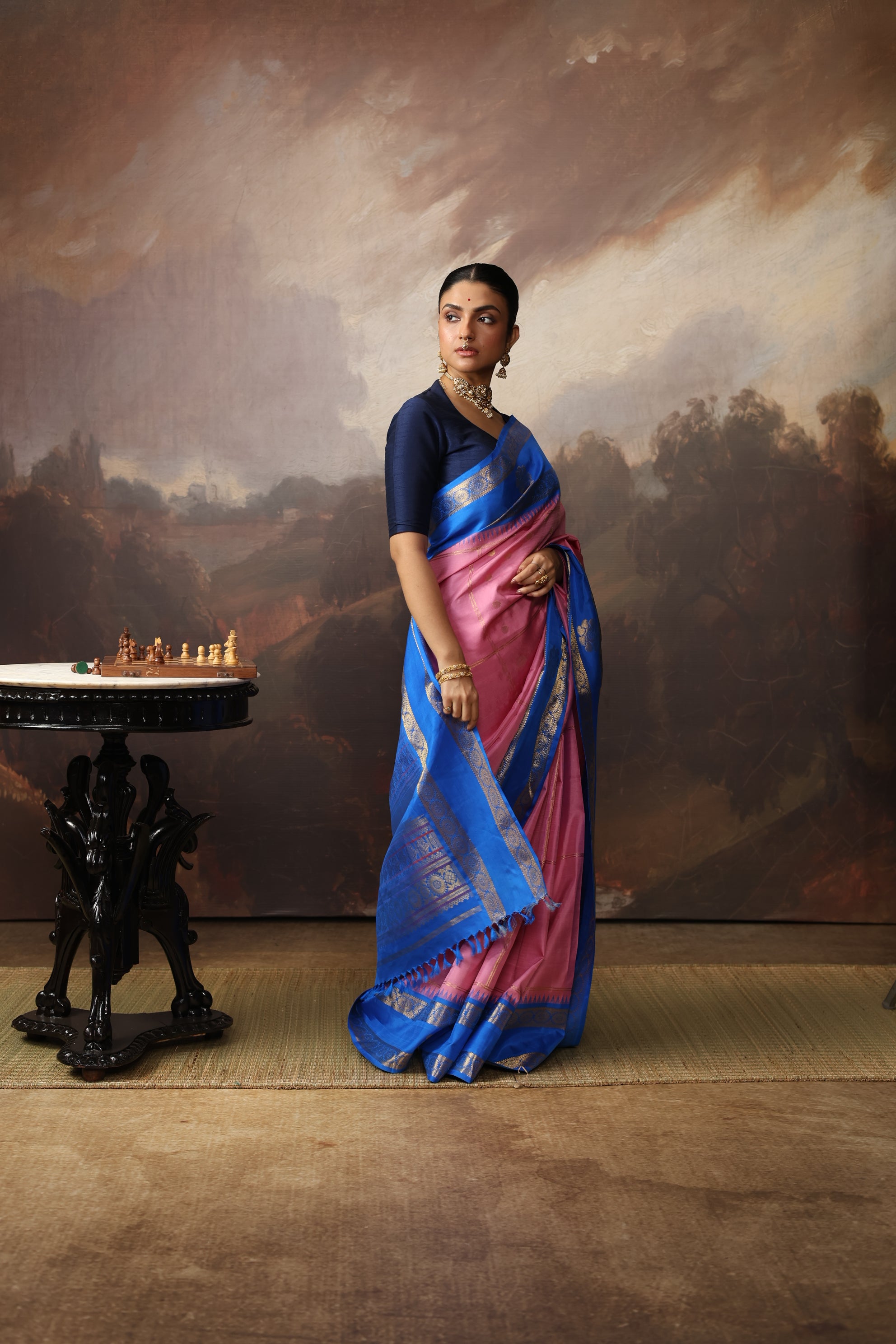 A unique vintage recreated and  beautiful combo of onion pink with cobalt blue korvai kanchivaram silk saree