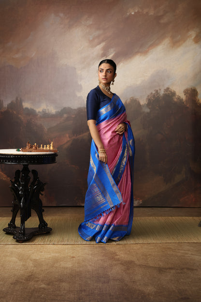 A unique vintage recreated and  beautiful combo of onion pink with cobalt blue korvai kanchivaram silk saree