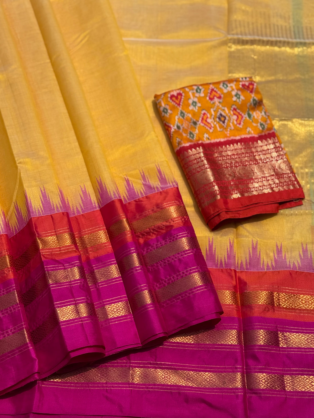 Handspun and handwoven ponduru Khadhi by silk  saree with silk border in contrast orange and pink jacquard weave