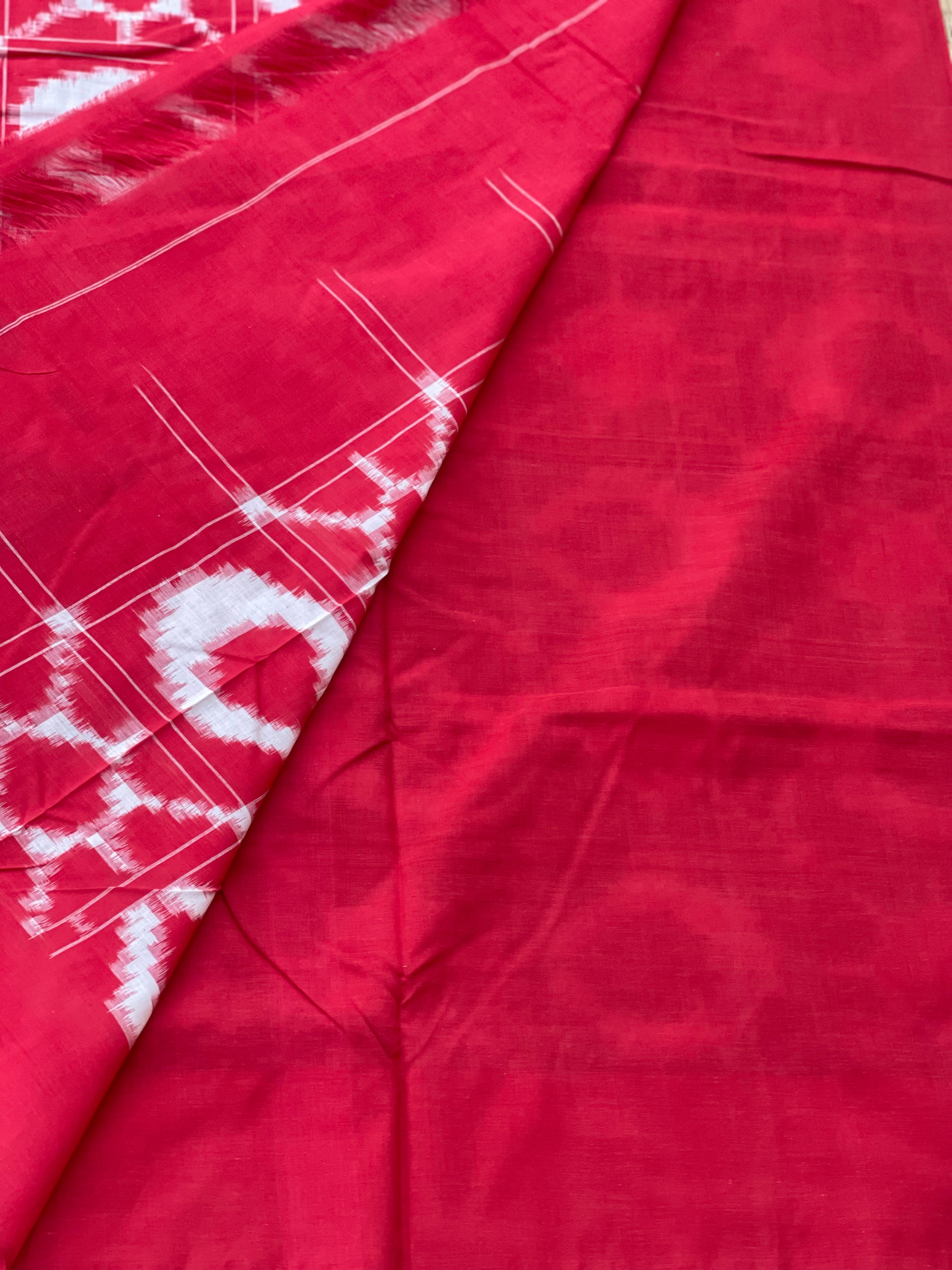 A traditional style Telia Rumal double ikkat cotton saree, with sun moon pattern