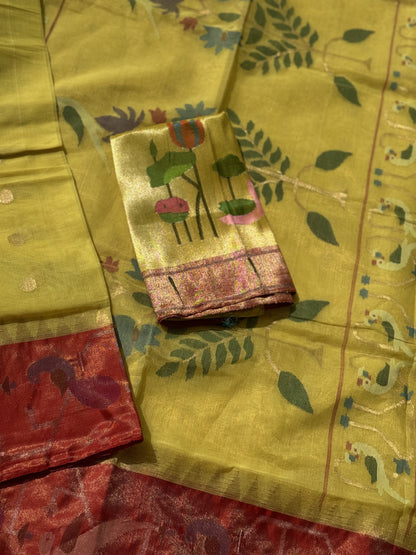 A Designer Exclusive Jaal Weave Ponduru Khadhi Jamdani with tissue Muniya paithani border with Peacock and Parrots