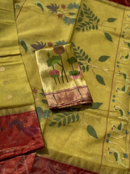 A Designer Exclusive Jaal Weave Ponduru Khadhi Jamdani with tissue Muniya paithani border with Peacock and Parrots