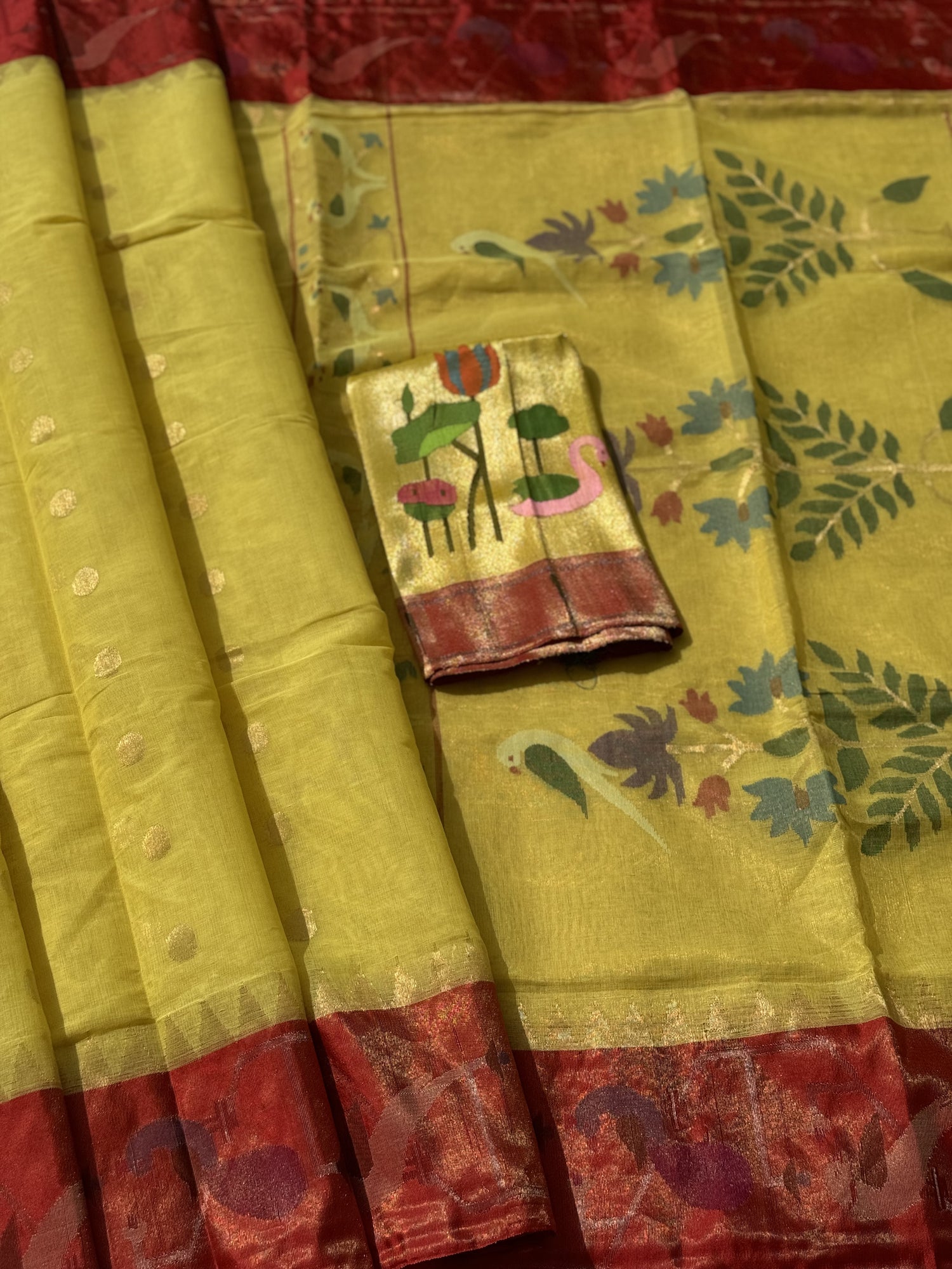 A Designer Exclusive Jaal Weave Ponduru Khadhi Jamdani with tissue Muniya paithani border with Peacock and Parrots