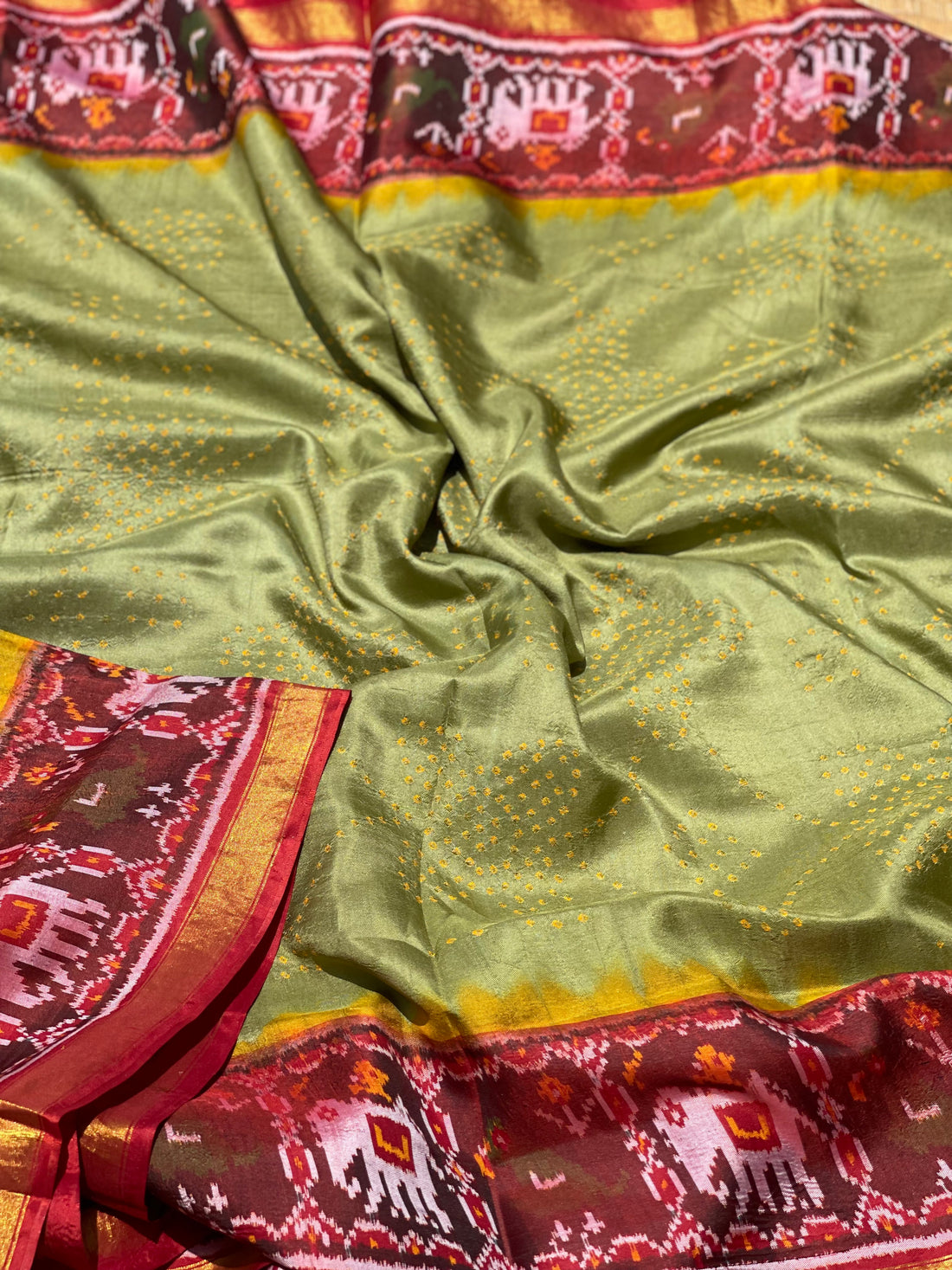 Hand knotted Rai Bhadhej Tie Dyed weft ikkat Rajkot silk saree on Moss green with yellow