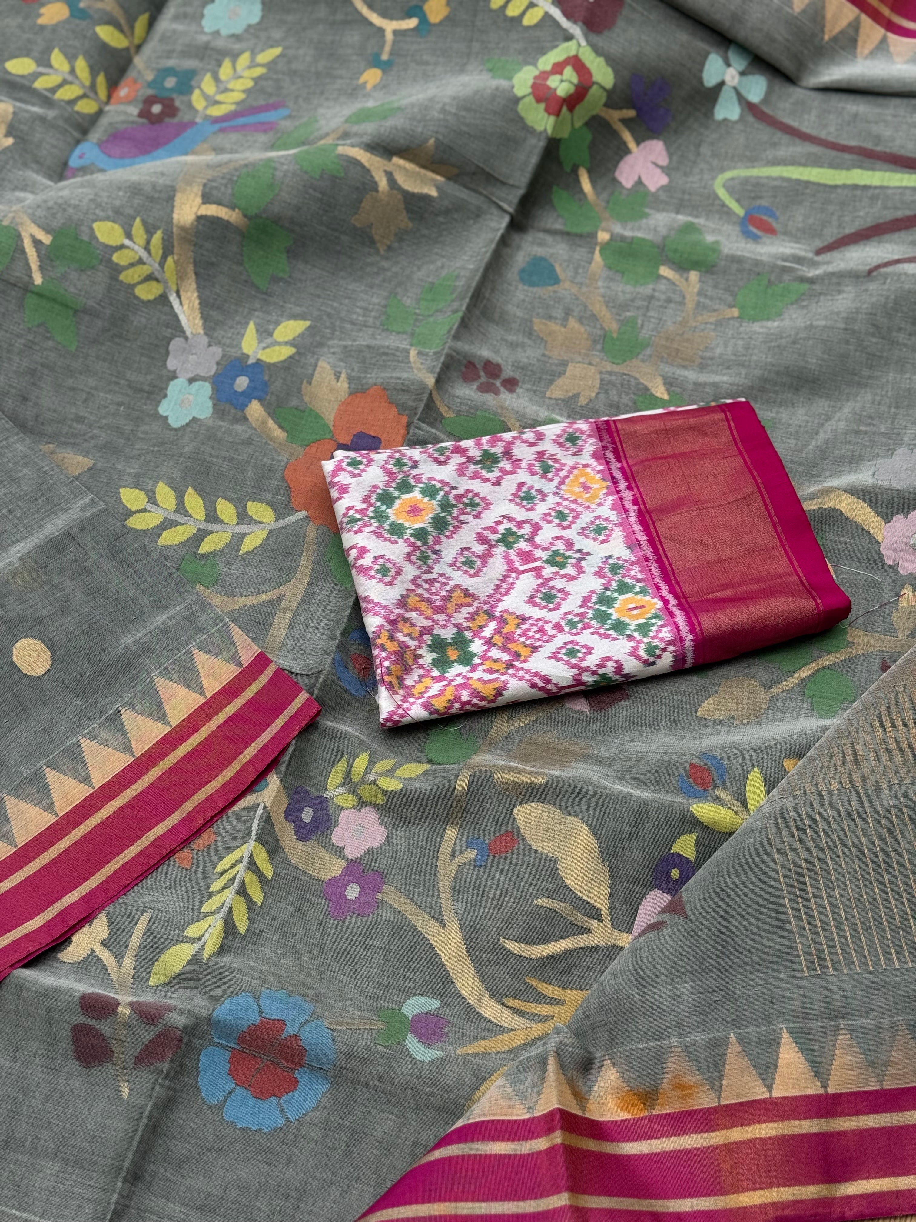 A gorgeous powder grey handspun ponduru Khadhi jamdani cotton saree
