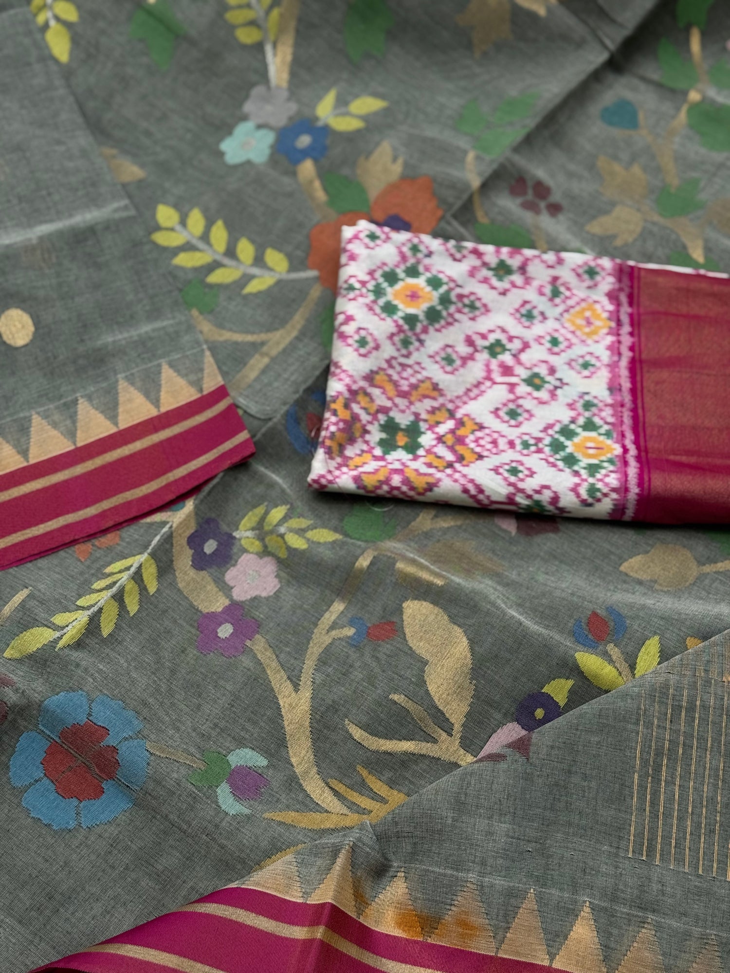 A gorgeous powder grey handspun ponduru Khadhi jamdani cotton saree