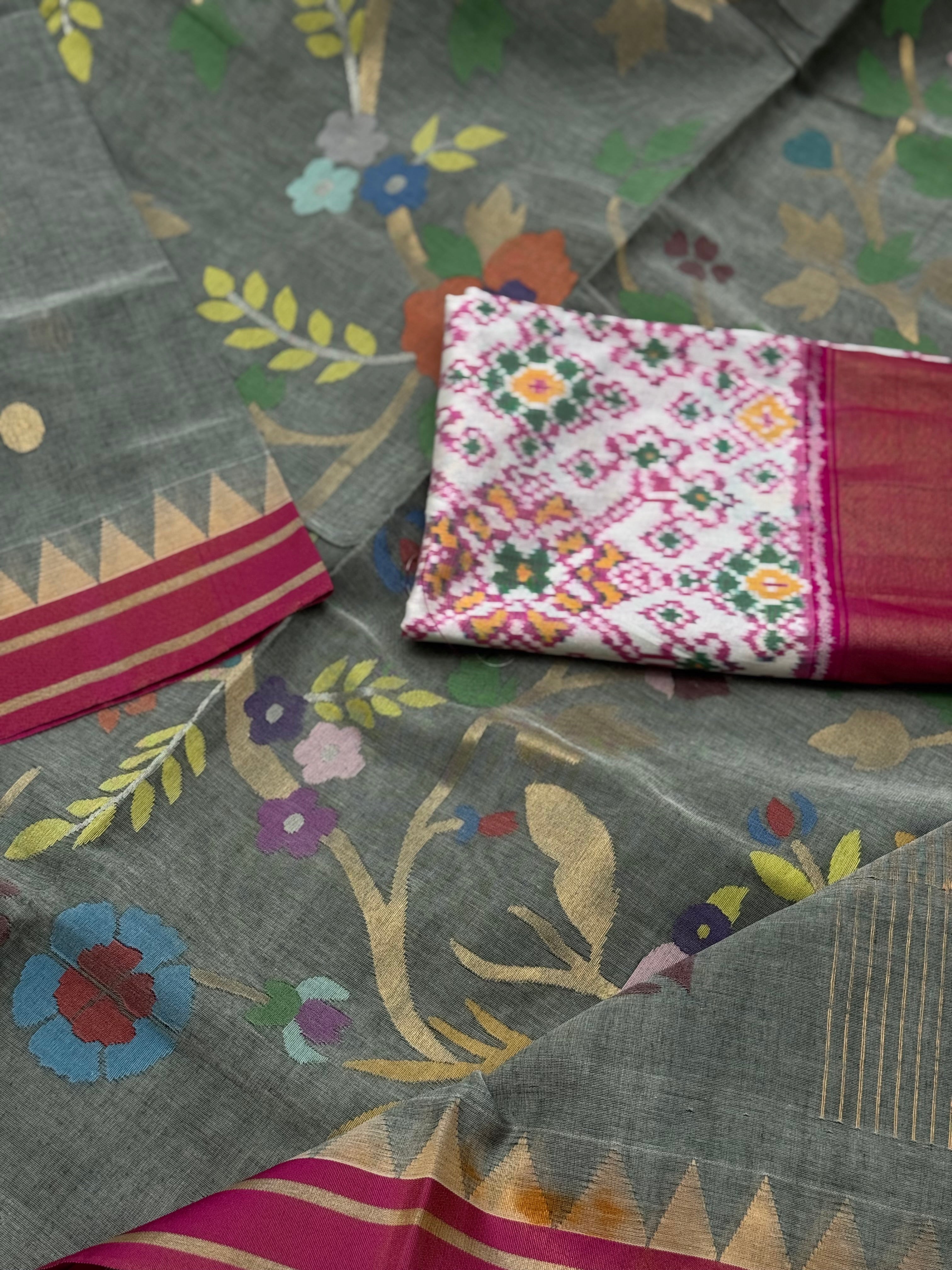 A gorgeous powder grey handspun ponduru Khadhi jamdani cotton saree
