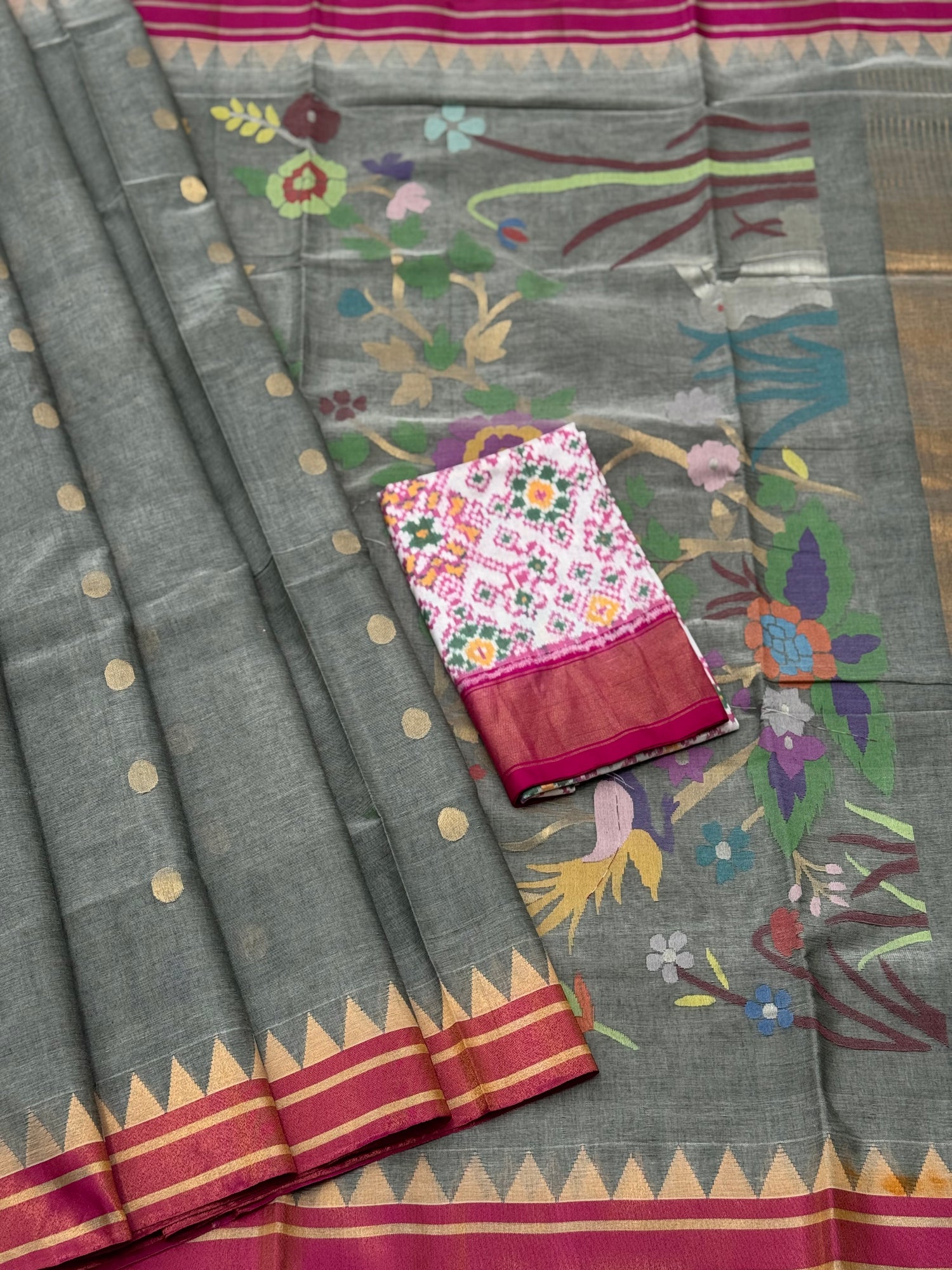 A gorgeous powder grey handspun ponduru Khadhi jamdani cotton saree