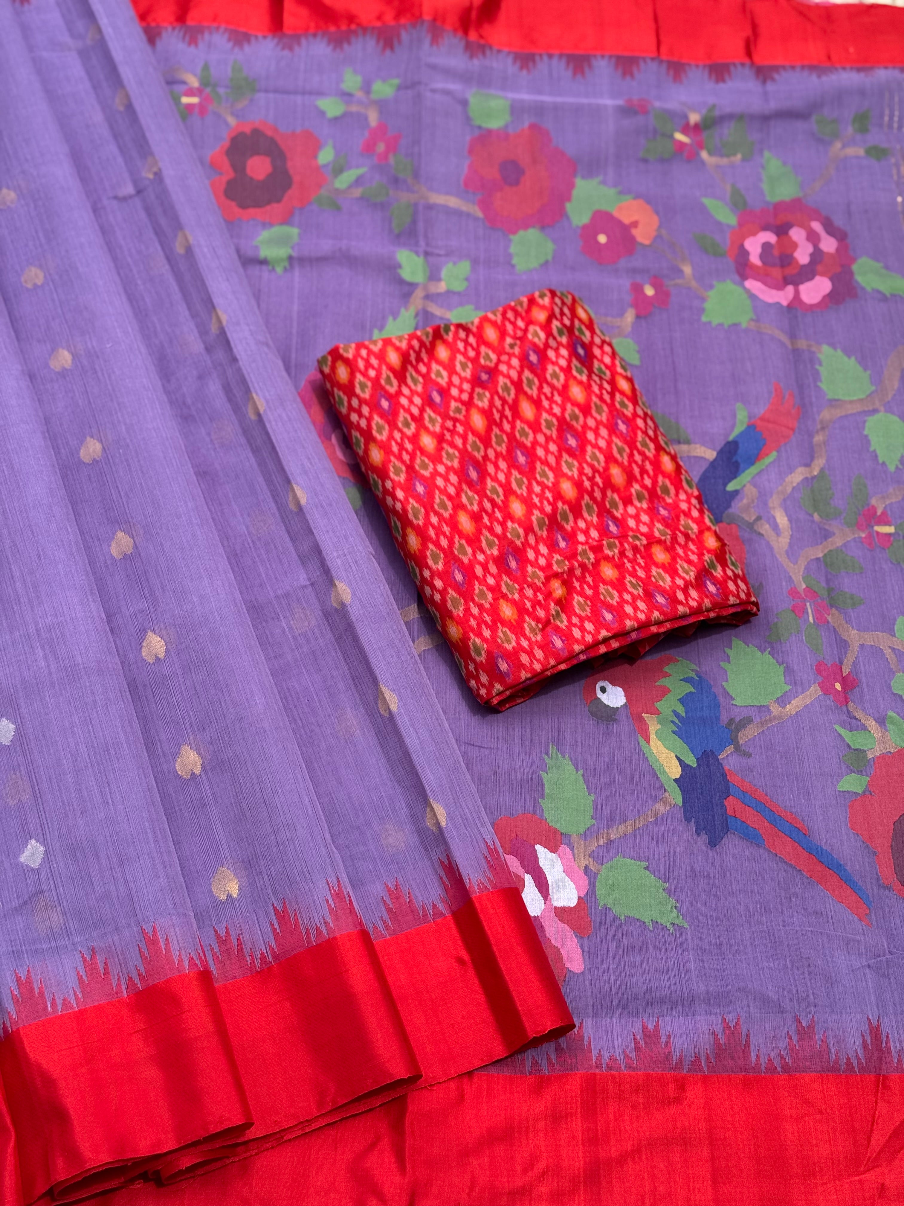 A gorgeous lilac with red shade handspun ponduru Khadhi jamdani cotton saree
