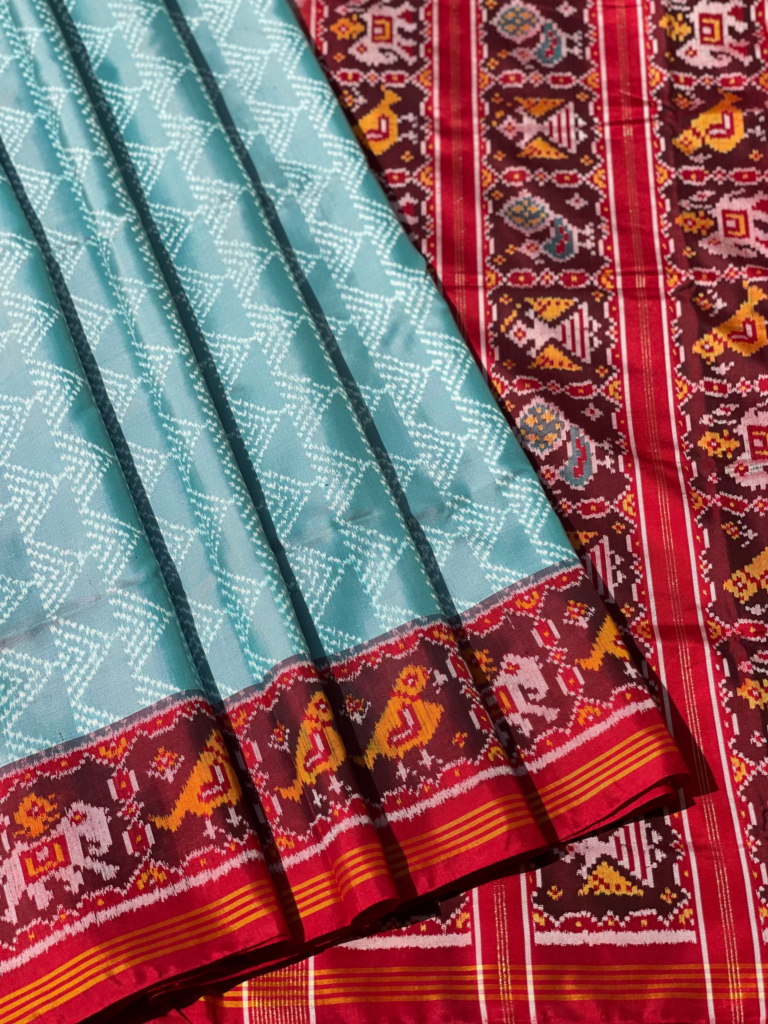 Cyan green Rajkot semi double ikkat Patola silk saree