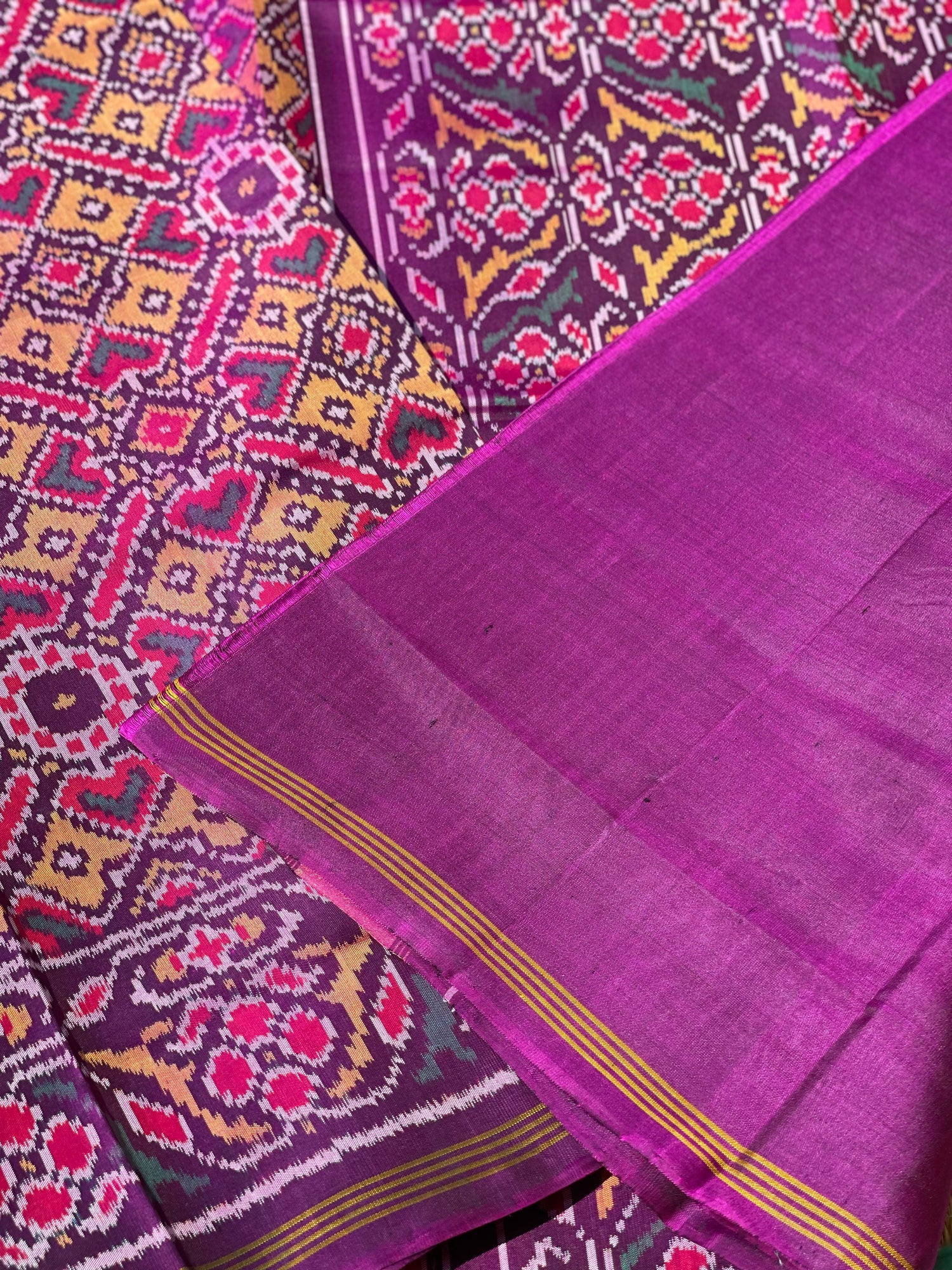 Purple shot with peach shade Rajkot semi double ikkat Patola silk saree