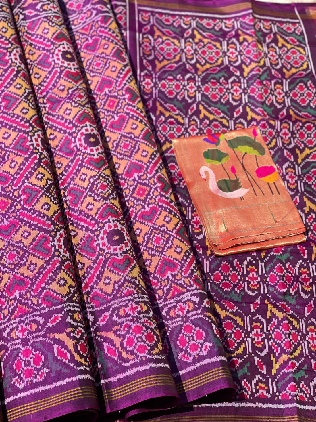 Purple shot with peach shade Rajkot semi double ikkat Patola silk saree