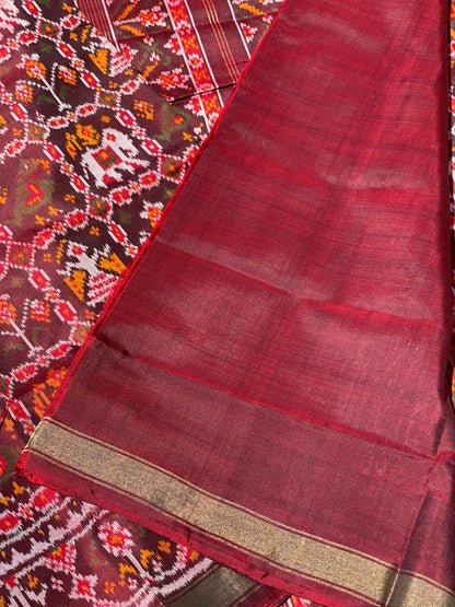 Deep burgundy Rajkot semi double ikkat Patola silk saree