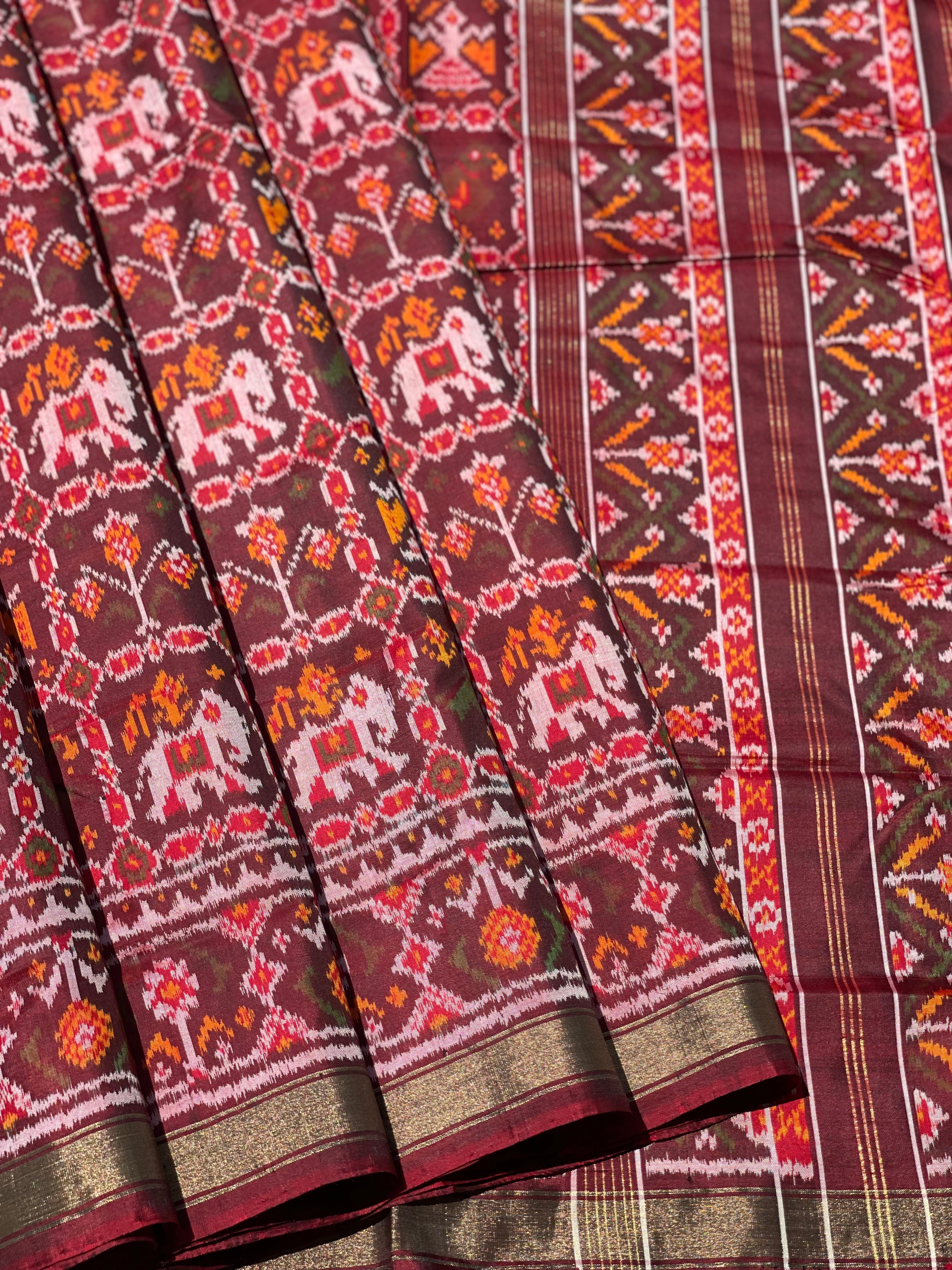 Deep burgundy Rajkot semi double ikkat Patola silk saree