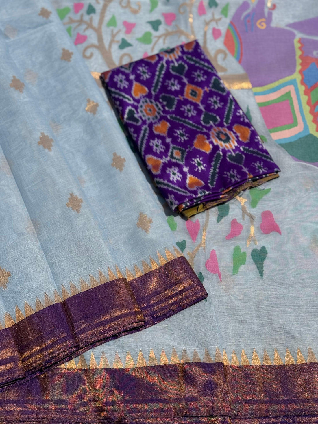 A gorgeous pastel powder blue shade handspun ponduru Khadhi jamdani cotton saree