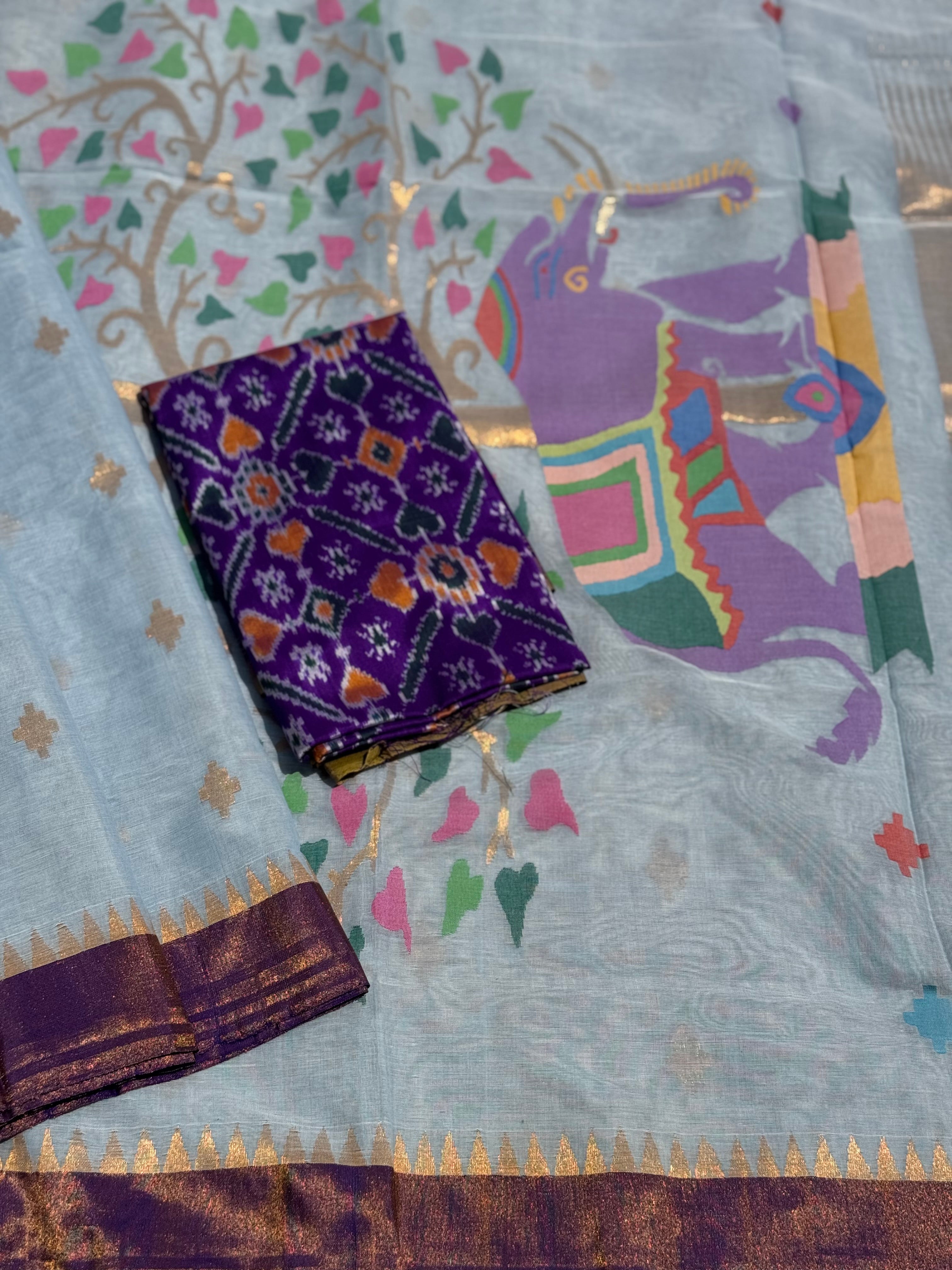 A gorgeous pastel powder blue shade handspun ponduru Khadhi jamdani cotton saree