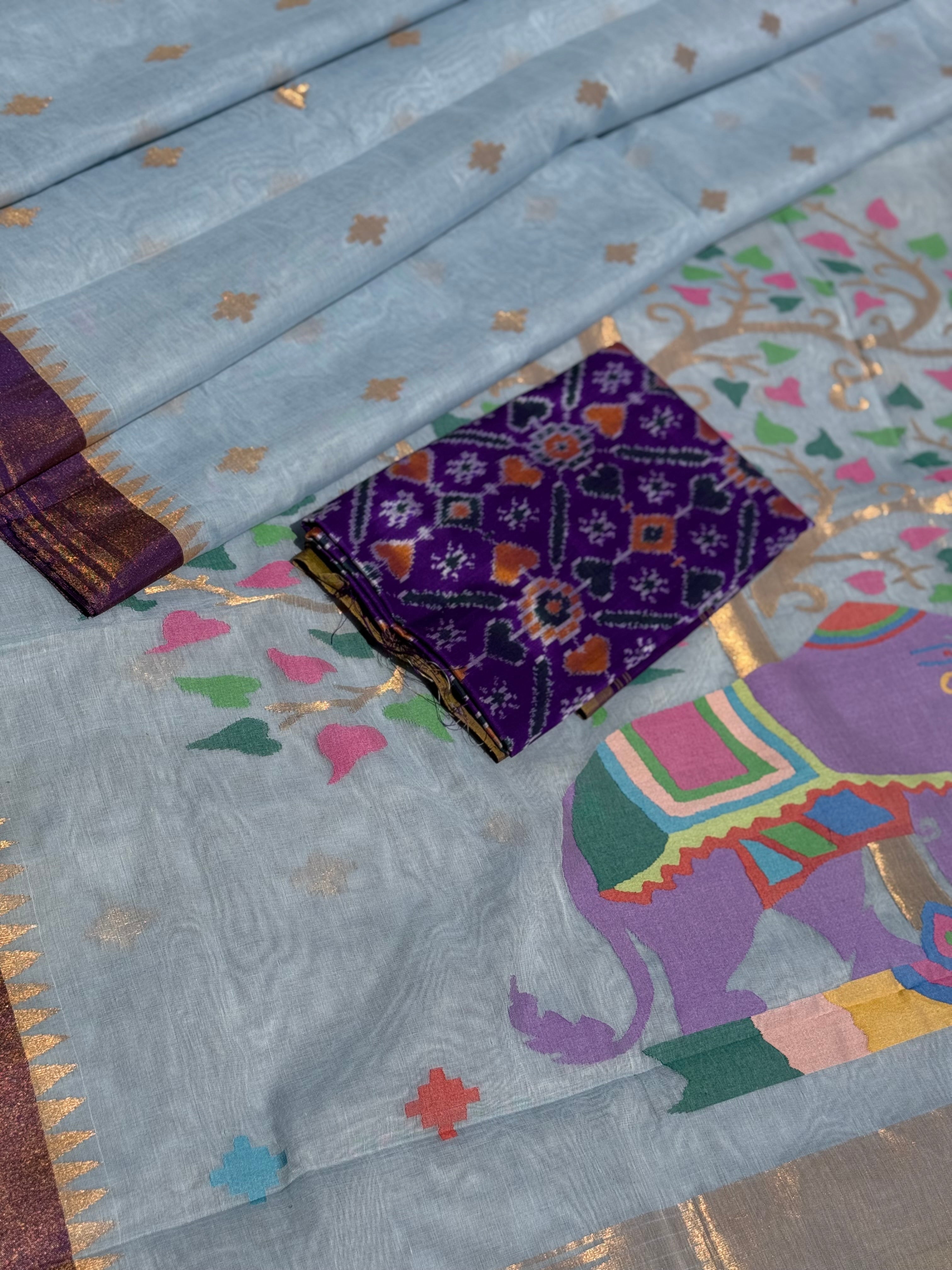 A gorgeous pastel powder blue shade handspun ponduru Khadhi jamdani cotton saree